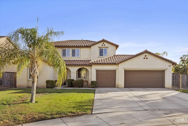 mediterranean / spanish home featuring a front lawn