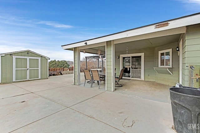 view of patio with a shed