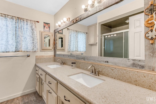 bathroom featuring vanity and walk in shower