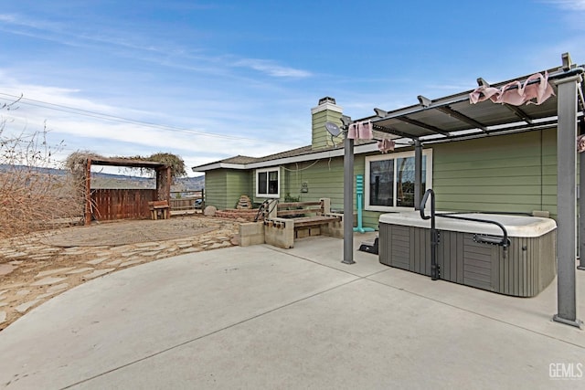 view of patio featuring a hot tub