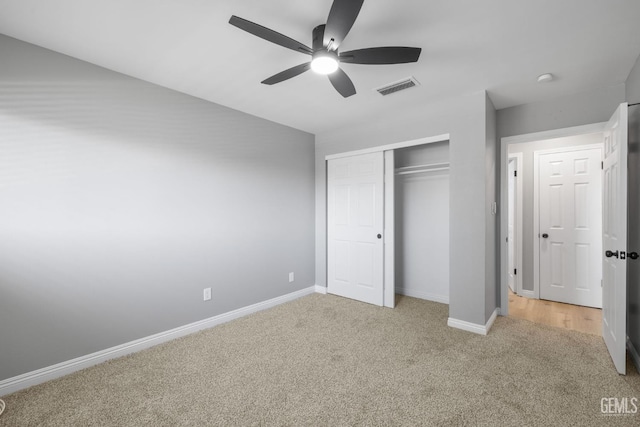 2848 Summit Cir, Bakersfield, CA 93306 - unfurnished bedroom with light carpet, a closet, and a ceiling fan