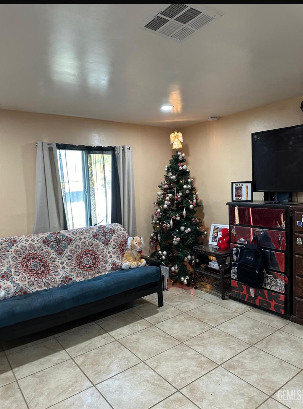 living room featuring light tile patterned floors