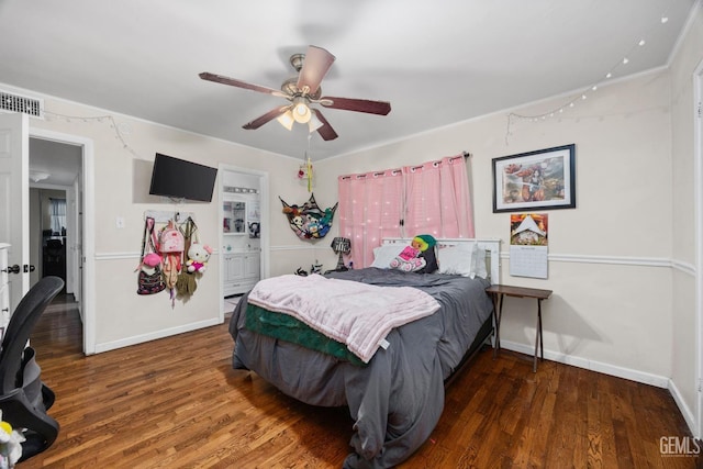 bedroom featuring dark wood-style floors, visible vents, and baseboards