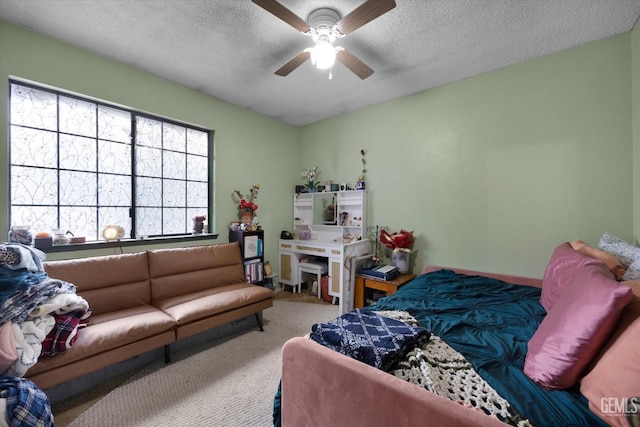 6009 Cedar Glen Ln, Bakersfield, CA 93313 - bedroom featuring carpet floors, a textured ceiling, ceiling fan, and baseboards
