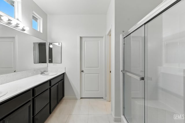 8907 Stevie Ct, Bakersfield, CA 93313 - bathroom with double vanity, a stall shower, and tile patterned flooring