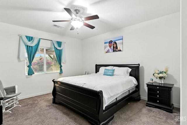 8907 Stevie Ct, Bakersfield, CA 93313 - bedroom with carpet flooring and a ceiling fan