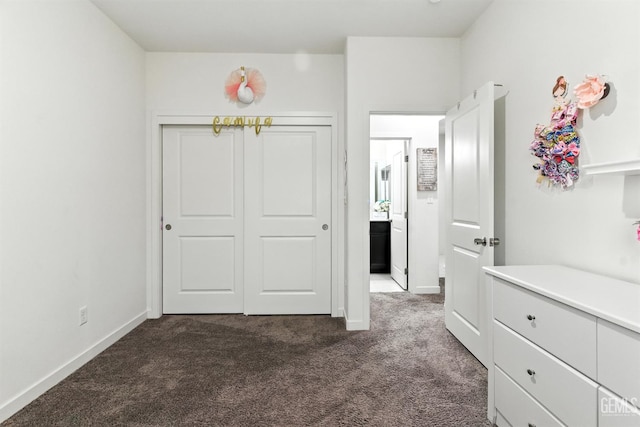 8907 Stevie Ct, Bakersfield, CA 93313 - bedroom with dark carpet and a closet