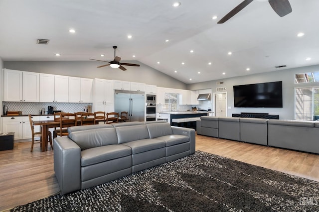 812 Mazatlan Dr, Bakersfield, CA 93314 - living room with a ceiling fan, light wood-style floors, recessed lighting, and high vaulted ceiling