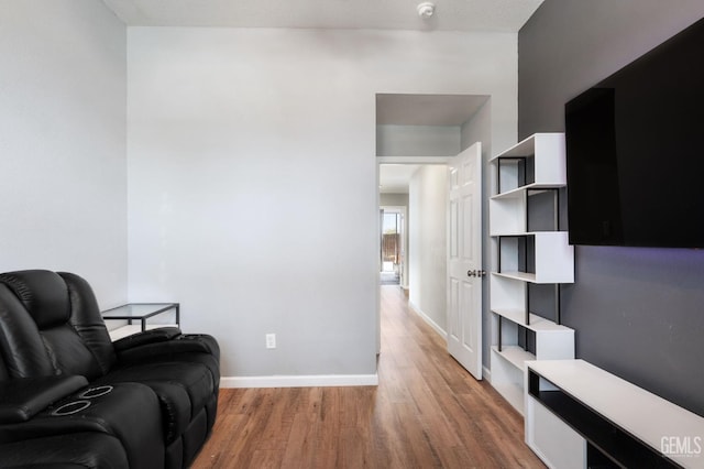 812 Mazatlan Dr, Bakersfield, CA 93314 - sitting room with wood finished floors and baseboards