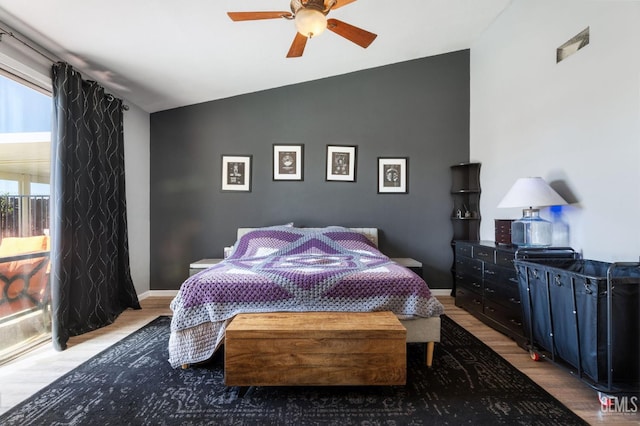 812 Mazatlan Dr, Bakersfield, CA 93314 - bedroom featuring wood finished floors, vaulted ceiling, and ceiling fan