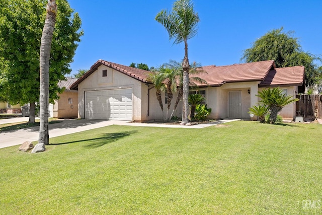 5601 Sugar Pine Dr, Bakersfield, CA 93313 - view of front of property with a tiled roof, an attached garage, driveway, and stucco siding