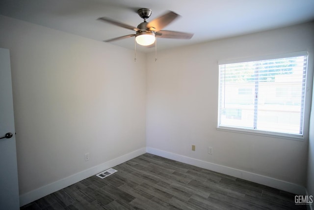 4801 Belle Ter Unit C, Bakersfield, CA 93309 - empty room with a ceiling fan and dark wood finished floors