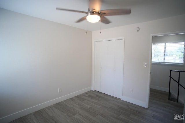 4801 Belle Ter Unit C, Bakersfield, CA 93309 - unfurnished bedroom with wood finished floors, a closet, and ceiling fan