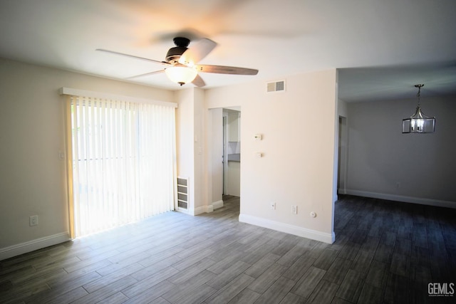 4801 Belle Ter Unit C, Bakersfield, CA 93309 - spare room featuring ceiling fan and dark wood finished floors