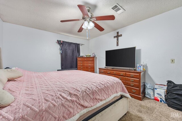 2110 Center St, Bakersfield, CA 93305 - bedroom with carpet floors, a textured ceiling, and ceiling fan