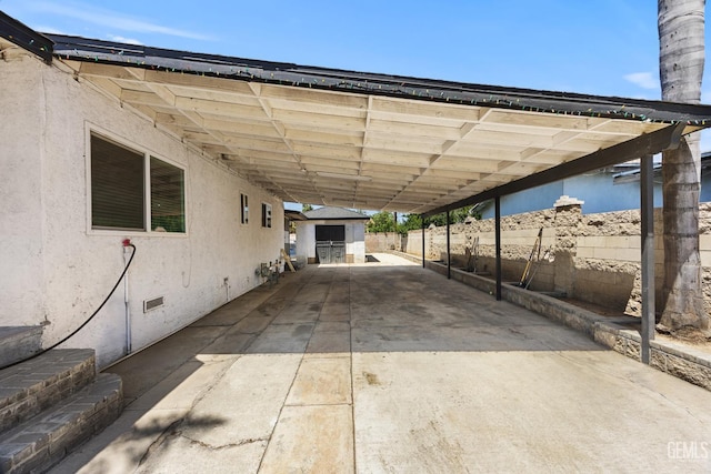 2110 Center St, Bakersfield, CA 93305 - view of patio / terrace with an attached carport and driveway