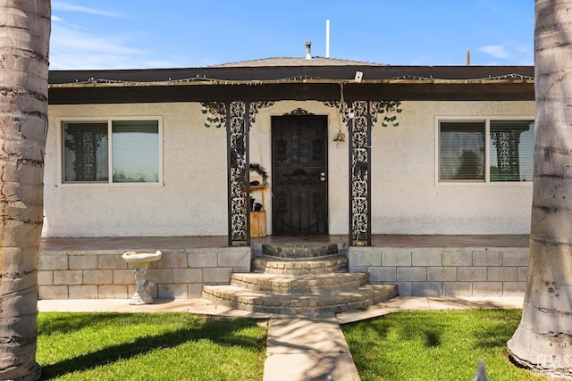2110 Center St, Bakersfield, CA 93305 - doorway to property featuring stucco siding