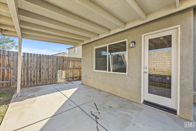 view of patio with fence