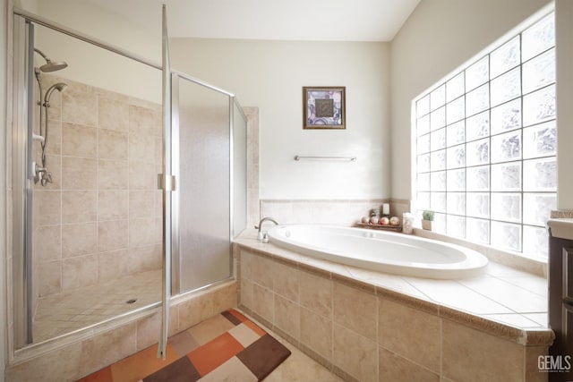 1705 Briercliff Ct, Bakersfield, CA 93311 - full bathroom featuring a garden tub, a stall shower, and plenty of natural light