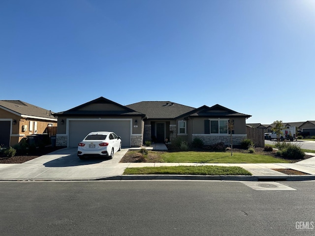 ranch-style house with a front yard and a garage