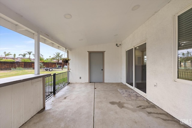 view of patio / terrace featuring fence