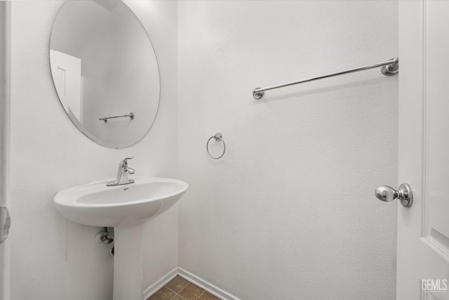 bathroom with tile patterned flooring