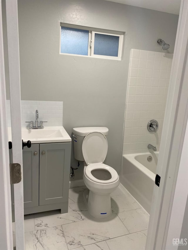 full bathroom with vanity, toilet, shower / bath combination, and backsplash