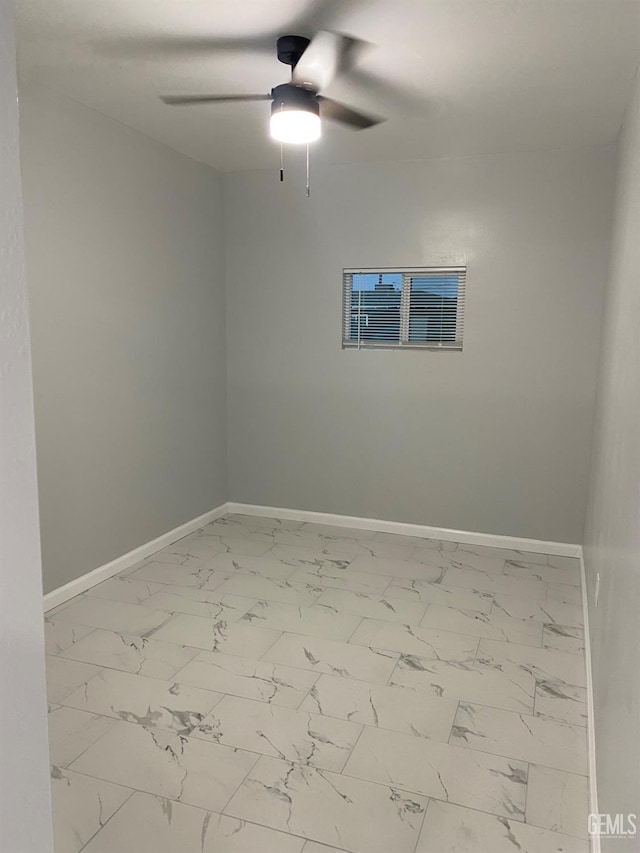 unfurnished room with ceiling fan