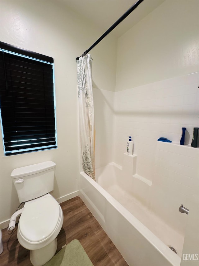 8410 Avon St, Bakersfield, CA 93314 - bathroom featuring wood finished floors and shower / bath combination with curtain