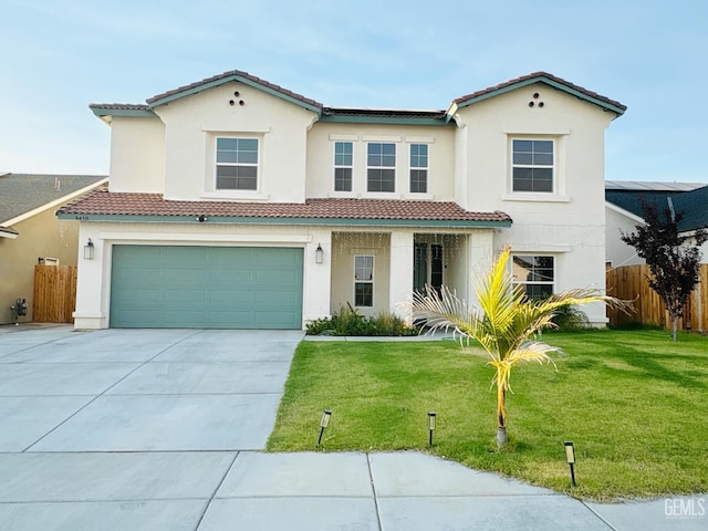 8410 Avon St, Bakersfield, CA 93314 - mediterranean / spanish-style house with driveway, a garage, a tile roof, and stucco siding