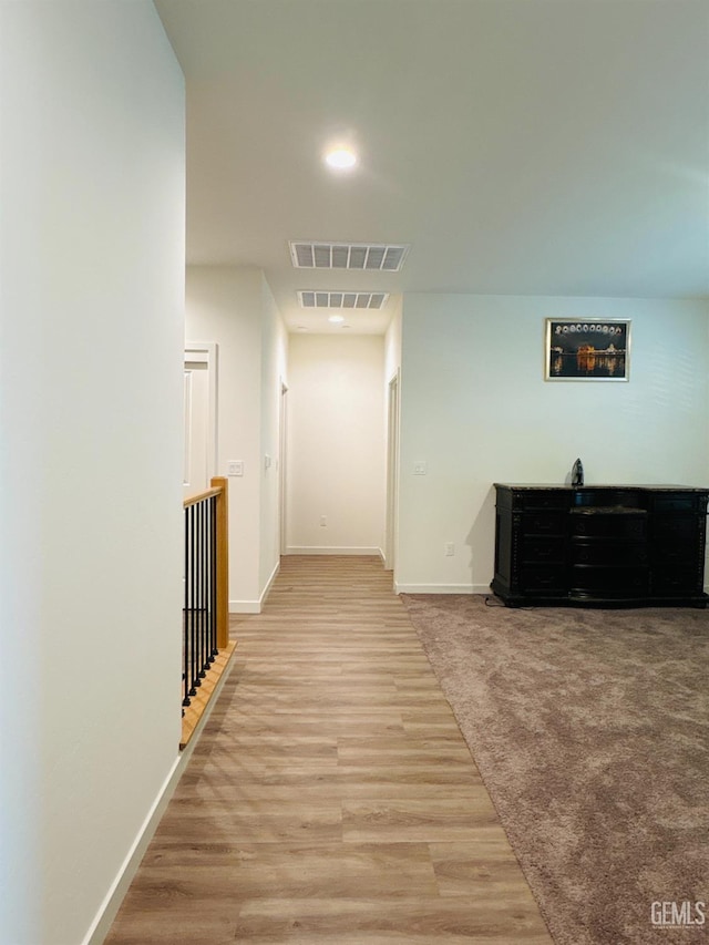 8410 Avon St, Bakersfield, CA 93314 - hallway featuring light wood-style floors and recessed lighting