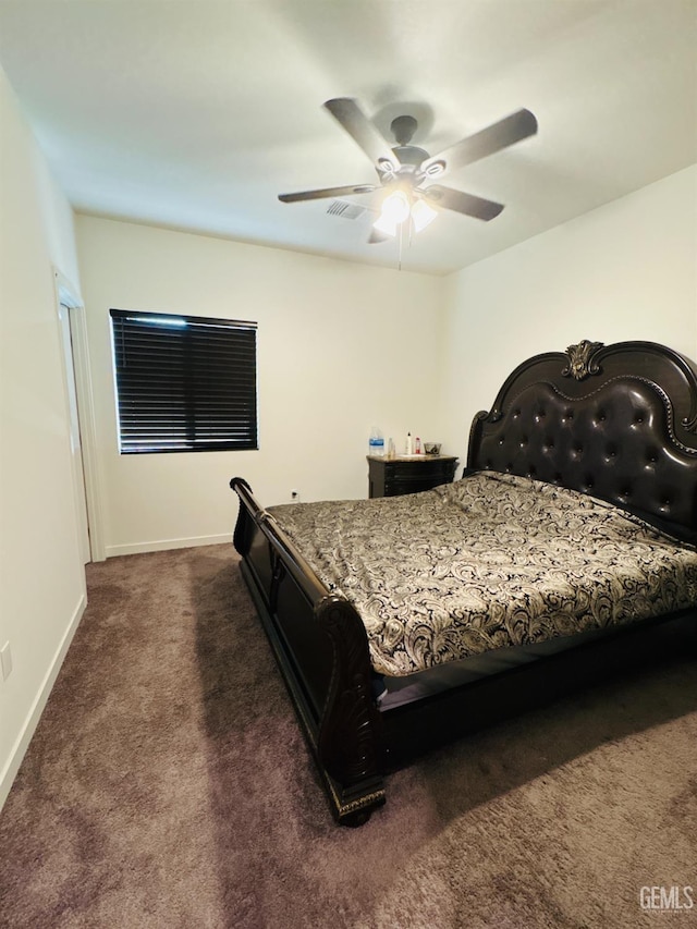 8410 Avon St, Bakersfield, CA 93314 - bedroom with dark colored carpet and a ceiling fan