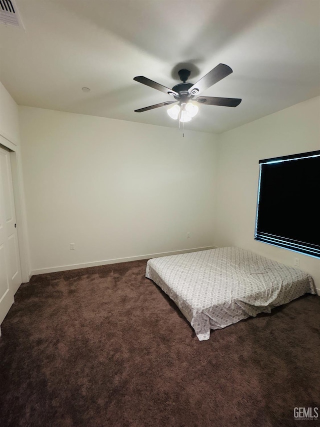 8410 Avon St, Bakersfield, CA 93314 - carpeted bedroom featuring baseboards and a ceiling fan