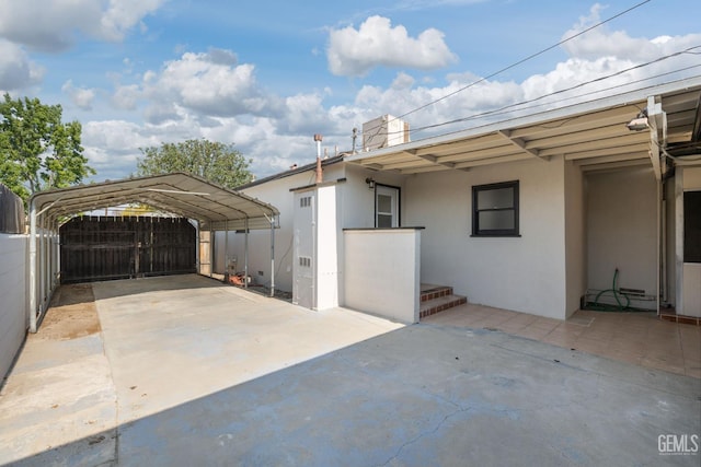 2702 Worthington Ave, Bakersfield, CA 93308 - garage with a carport and concrete driveway