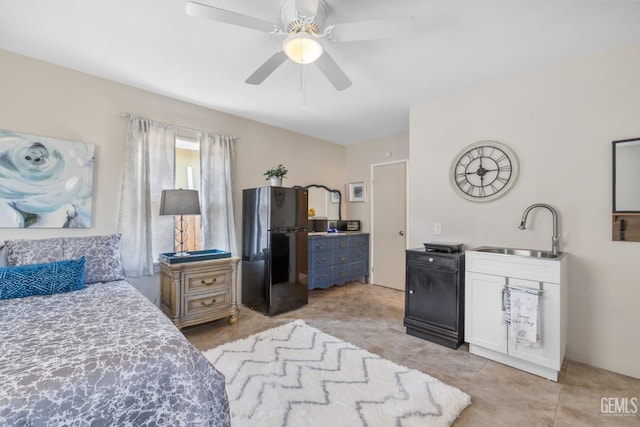 2702 Worthington Ave, Bakersfield, CA 93308 - bedroom featuring freestanding refrigerator, light tile patterned flooring, and ceiling fan