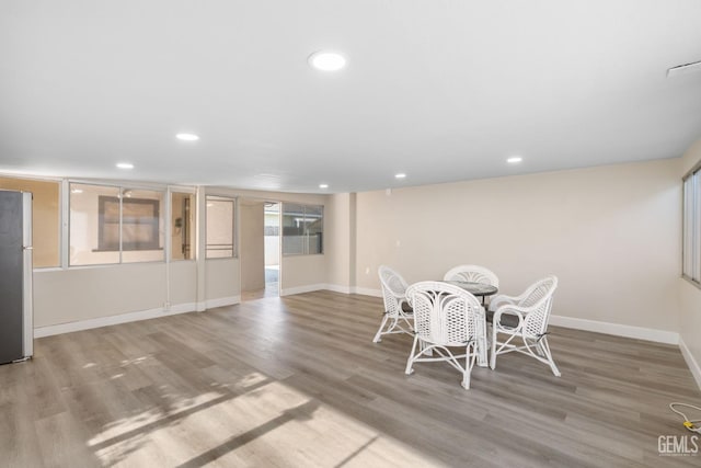 2702 Worthington Ave, Bakersfield, CA 93308 - unfurnished dining area featuring recessed lighting and wood finished floors