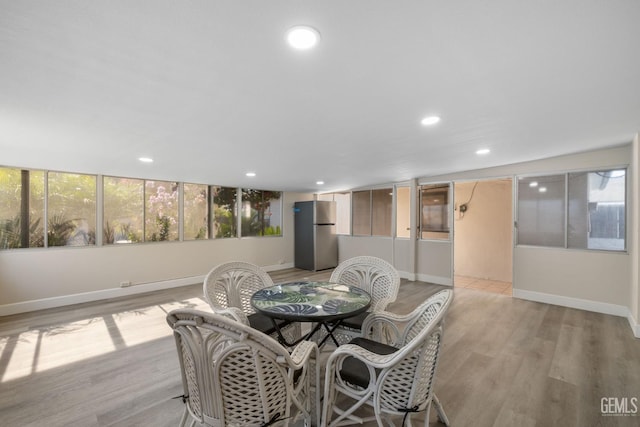 2702 Worthington Ave, Bakersfield, CA 93308 - dining space with recessed lighting and light wood-style floors