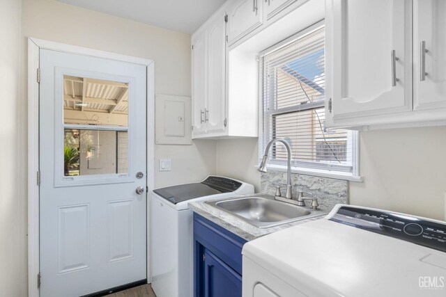 2702 Worthington Ave, Bakersfield, CA 93308 - laundry area featuring cabinet space and independent washer and dryer
