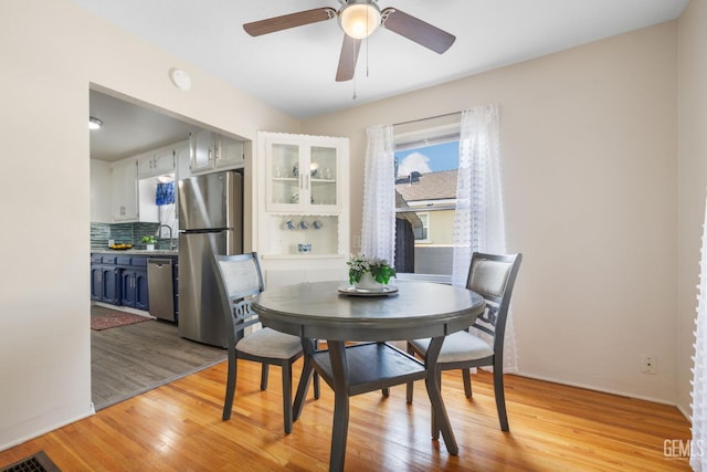 2702 Worthington Ave, Bakersfield, CA 93308 - dining space with ceiling fan and light wood-type flooring