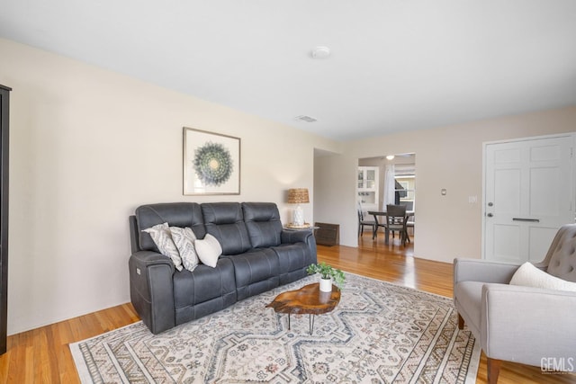 2702 Worthington Ave, Bakersfield, CA 93308 - living room featuring wood finished floors