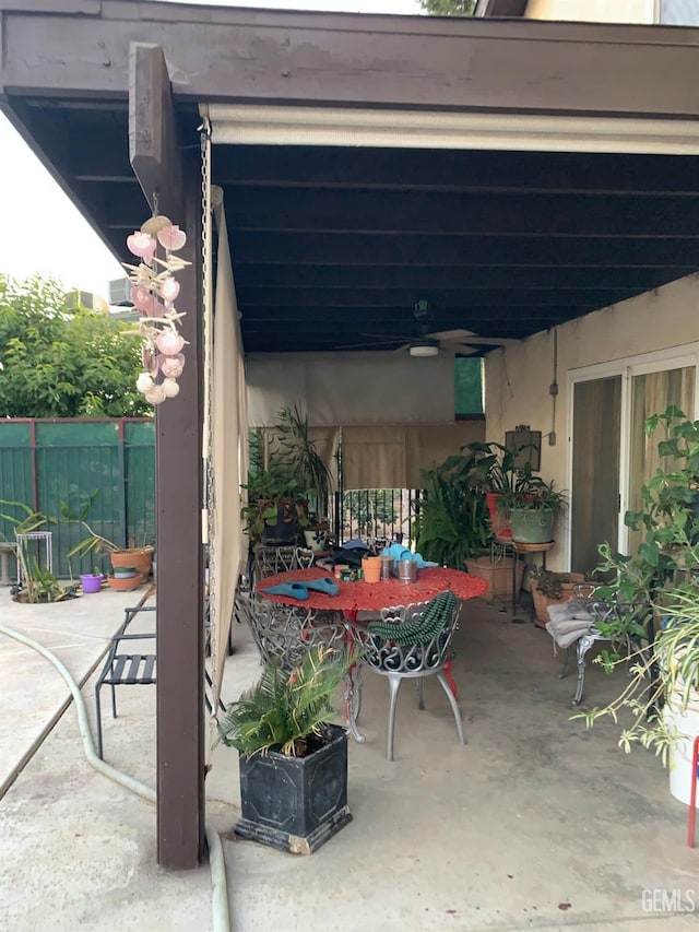 view of patio / terrace featuring ceiling fan