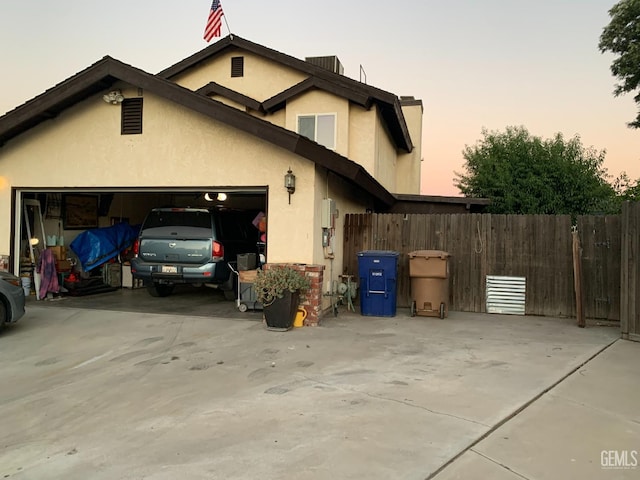 exterior space with a garage