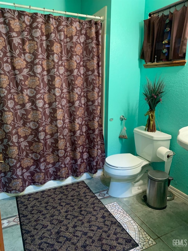 bathroom featuring toilet