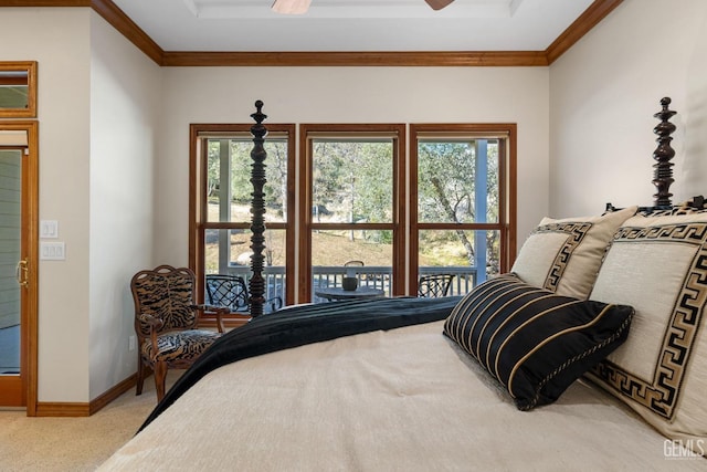 bedroom with carpet flooring, ceiling fan, and crown molding