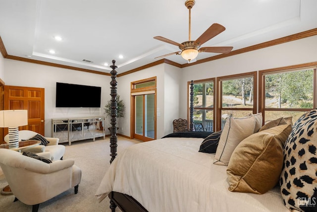 carpeted bedroom with ceiling fan and ornamental molding