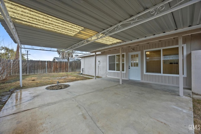 view of patio / terrace featuring fence