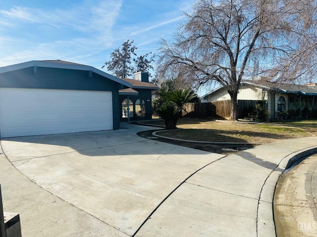 view of side of property featuring a garage