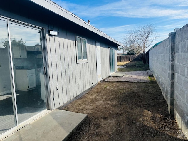 view of home's exterior featuring a patio area