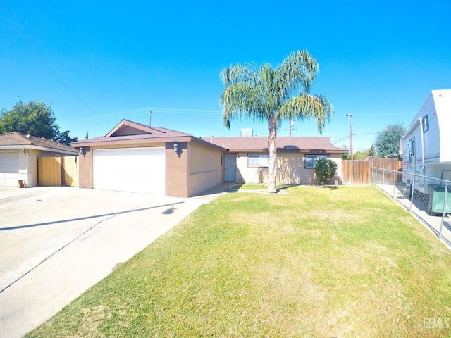 single story home featuring a front yard and a garage