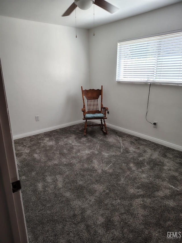 unfurnished room with ceiling fan, carpet floors, and baseboards